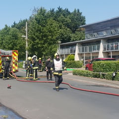 UPDATE: Dozens evacuated as flat catches fire