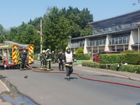 UPDATE: Dozens evacuated as flat catches fire