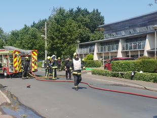 UPDATE: Dozens evacuated as flat catches fire