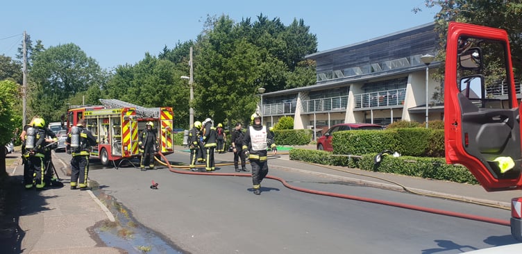 Firefighters don breathing apparatus to tackle a fire in a block of flats in Wellington on Tuesday.