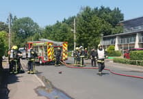 Firefighters and police evacuate block of flats after blaze caused by electrical fault