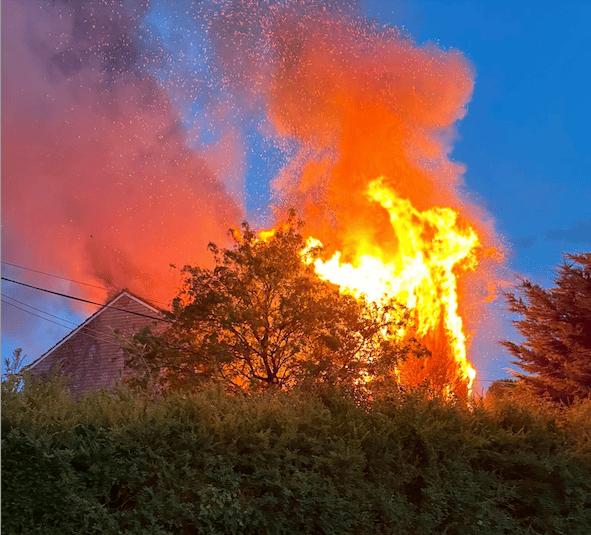 Flames consume a pair of semi-detached houses in Oake, near Wellington.