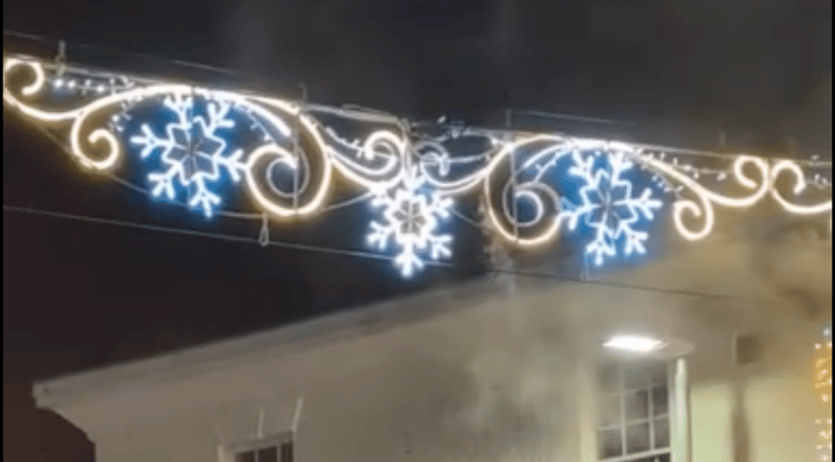 Smoke can be seen billowing from Christmas lights which caught fire in Wellington last year.