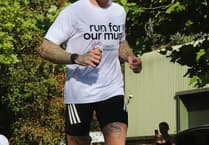 Runner completes 24-hour challenge for cancer charity