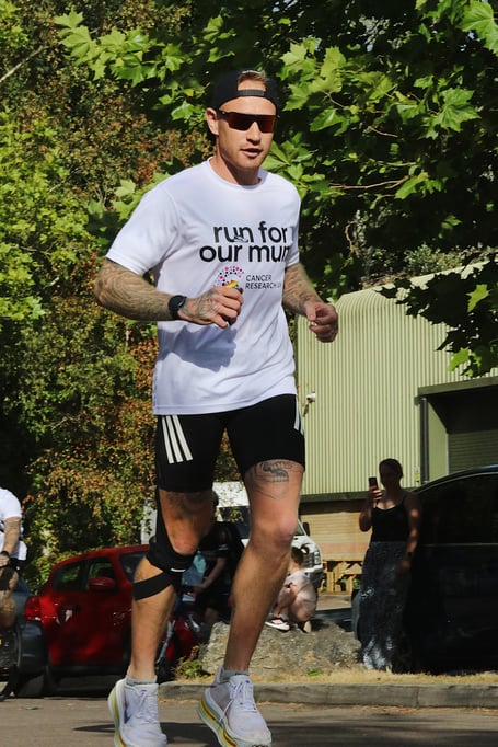 James Webber completes epic marathon challenge by running four marathons in 24 hours for cancer charity.