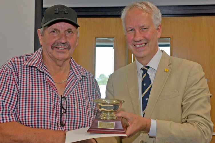 MP Gideon Amos presented trophies including the Wellington Weekly News Bowl to Mike Hawkins.