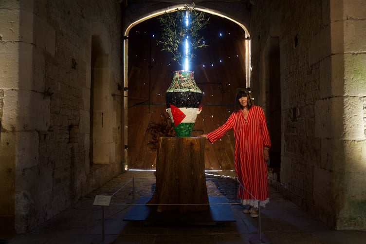 Candace Bahouth's Ode to the Ancestors features a clay urn, broken china, tesserae and tiles, badges and plastic olive tree.