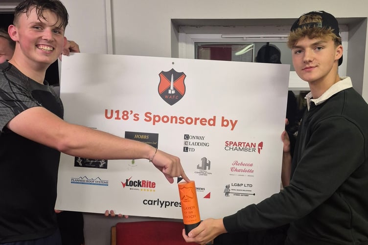 Player of the match Ethan (left) is pictured with injured teammate Spencer.
