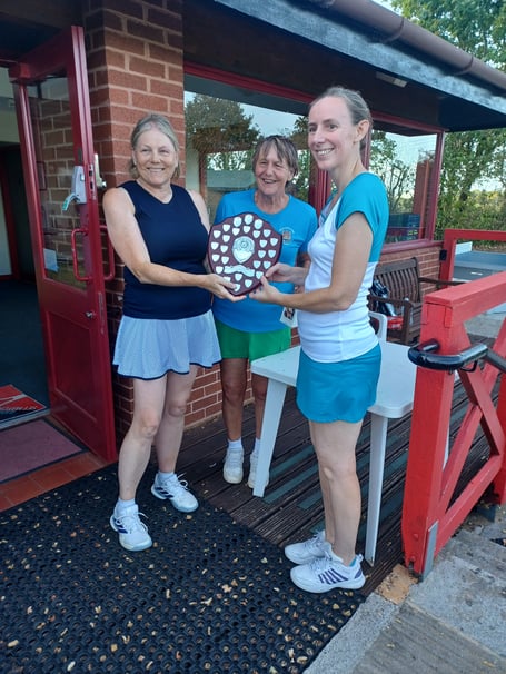Bridgwater chair Carole Beach (right) presents Sue (left) and Liz with the winning shield