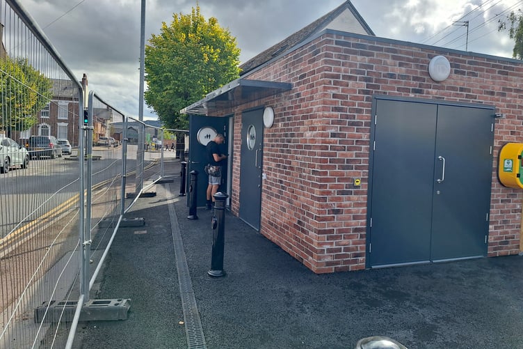 Wellington's new Longforth Road public toilets are moving closer to being opened after protective bollards were installed on the pavement in front of the block.