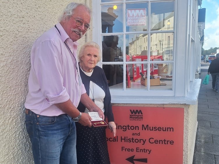 Wellington Museum chairman Mike Menhenitt with Gloria Parkinson, who was the mystery tenant of the town's 1,000th council house and the golden key which was presented to the council to mark the occasion in 1969.