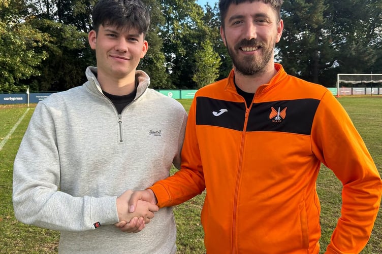 Matt Brereton with manager Connor Porter.