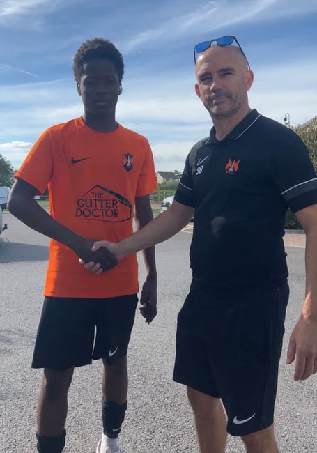 Man of the Match Gbuyi O with coach Scott Bates
