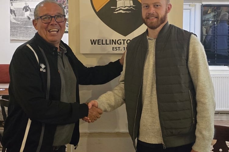 Defender Jack Lewis was Wellington's player of the match against Clevedon Town and he is pictured with interim chairman Graham Aspin.