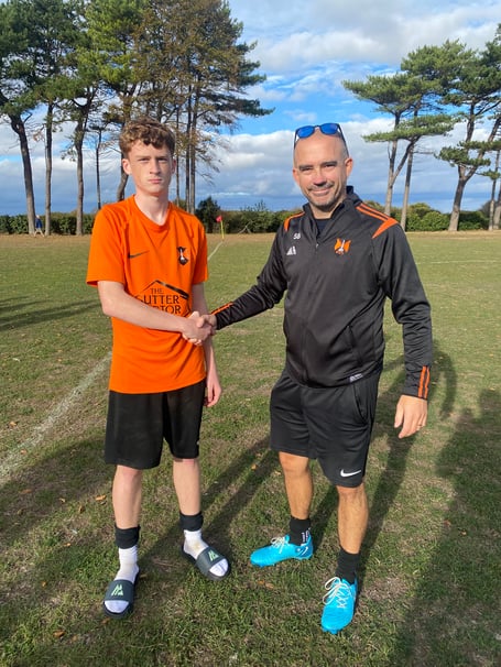 Player of the Match Oscar A and coach Scott Bates