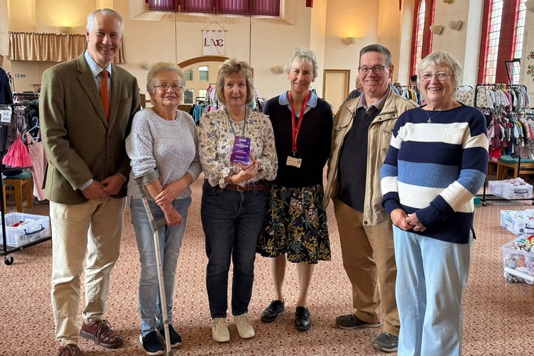 MP Gideon Amos joined the Clothes Swap team at a gathering of community groups that use Wellington Methodist Church.