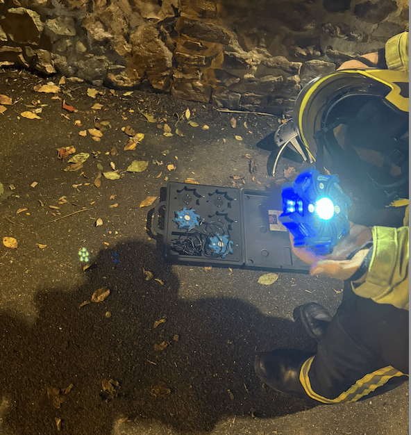 A Wellington firefighter holds an example of the type of emergency lights which were stolen while crews were attending to a car crash in the town.